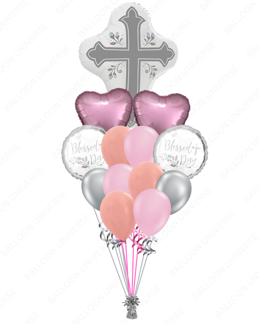 Balloon bouquet with cross, hearts, and 'Blessed Day' balloons