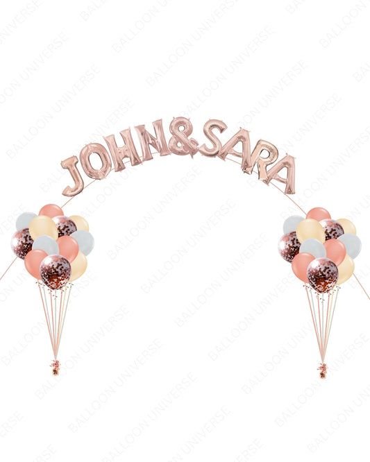 Elegant Blush and Rose Gold Bouquets with Custom Phrase Arch